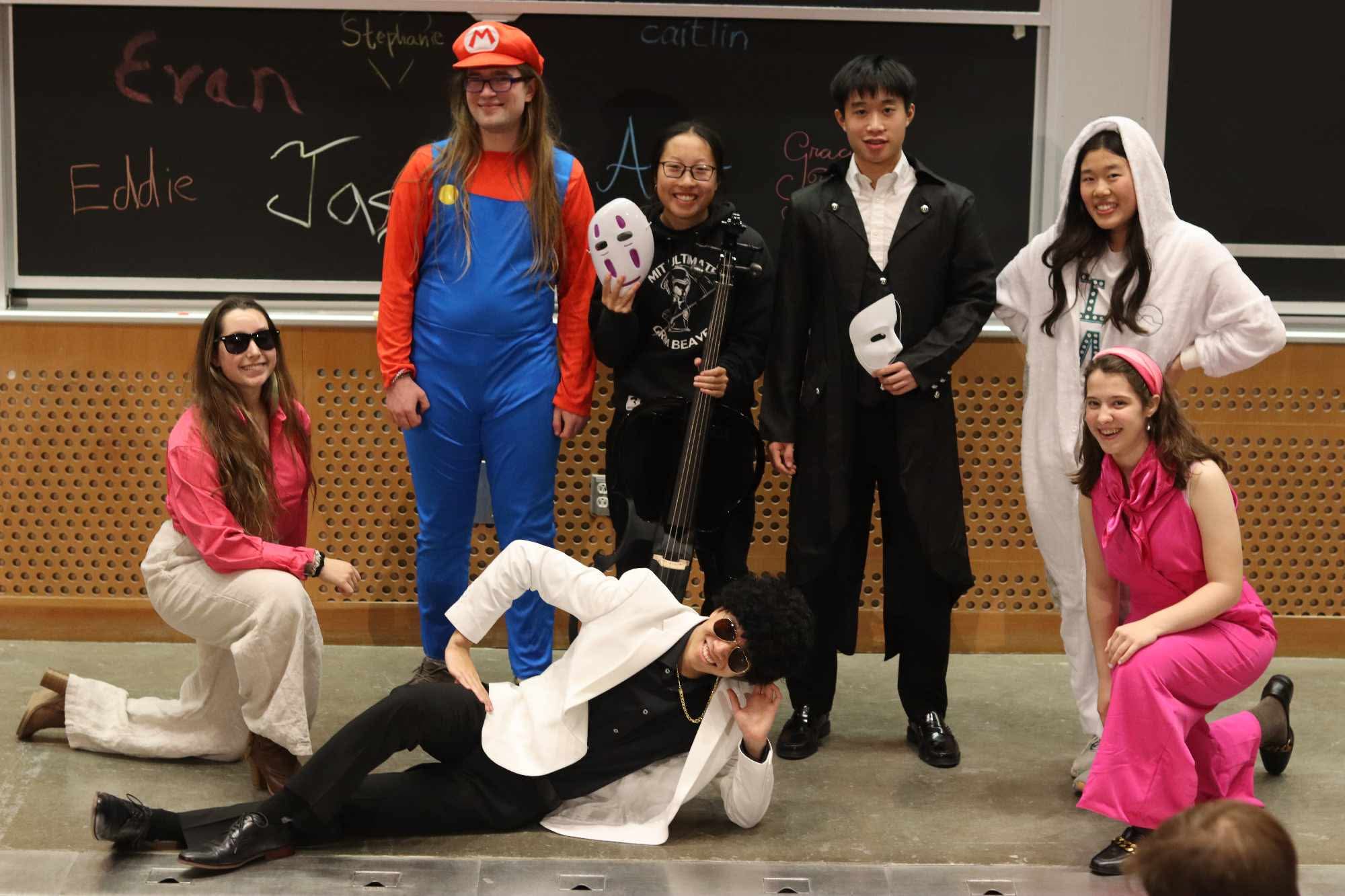 Members pose dressed in costume after the Fall 2024 showcase.